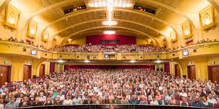 Packed audience at a cultural theatre event